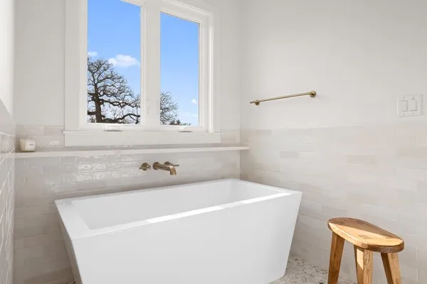 a bathroom with a bathtub