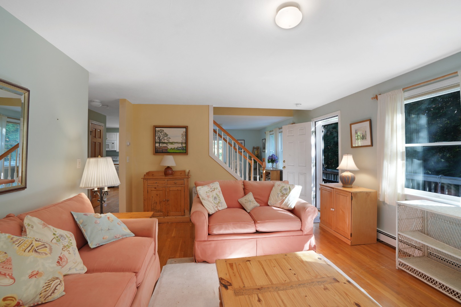 22 Old Lighthouse Road Vineyard Haven, MA 02568 - Photo 11 of 26 a living room with furniture and a flat screen tv