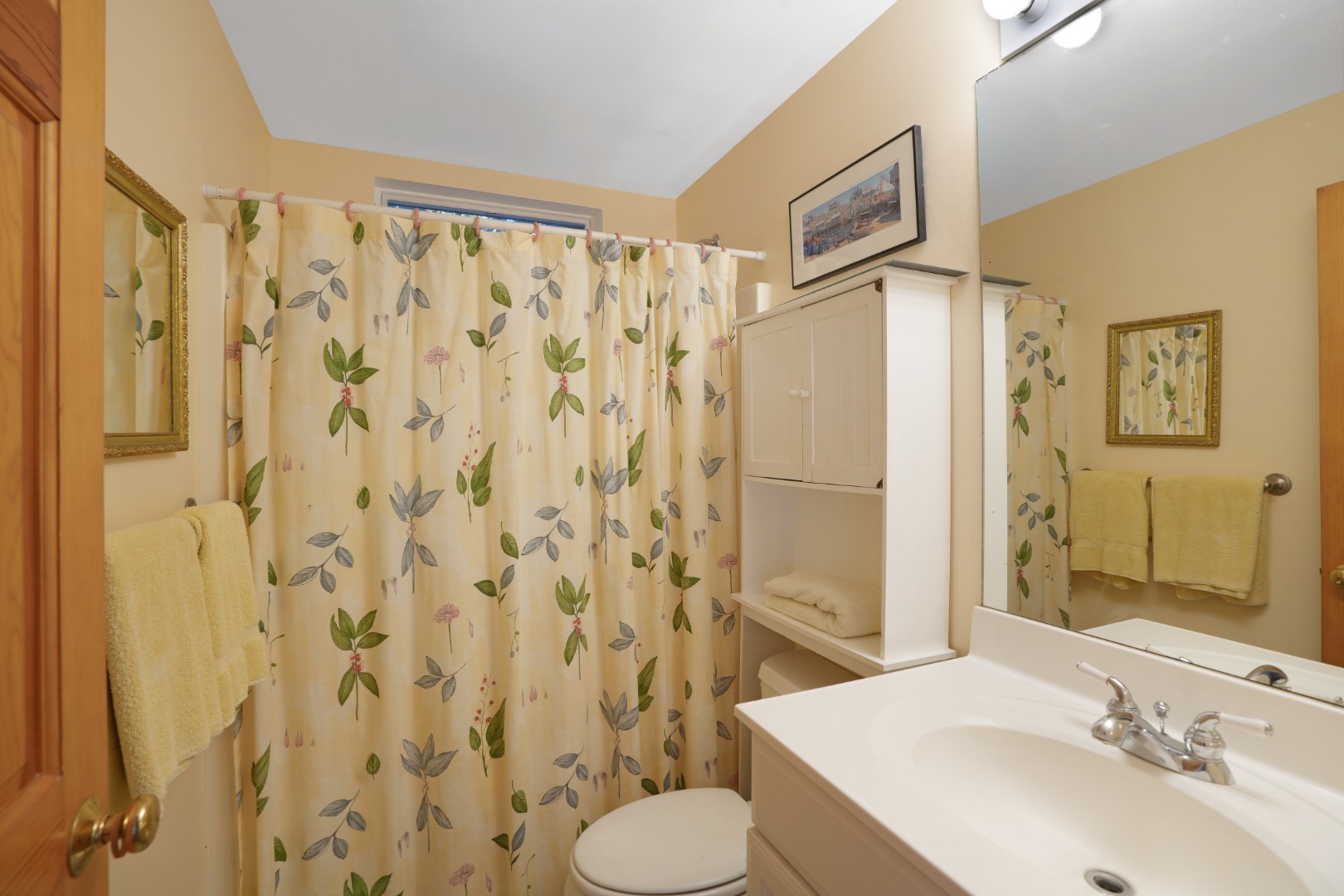 22 Old Lighthouse Road Vineyard Haven, MA 02568 - Photo 14 of 26 a bathroom with a sink toilet and shower