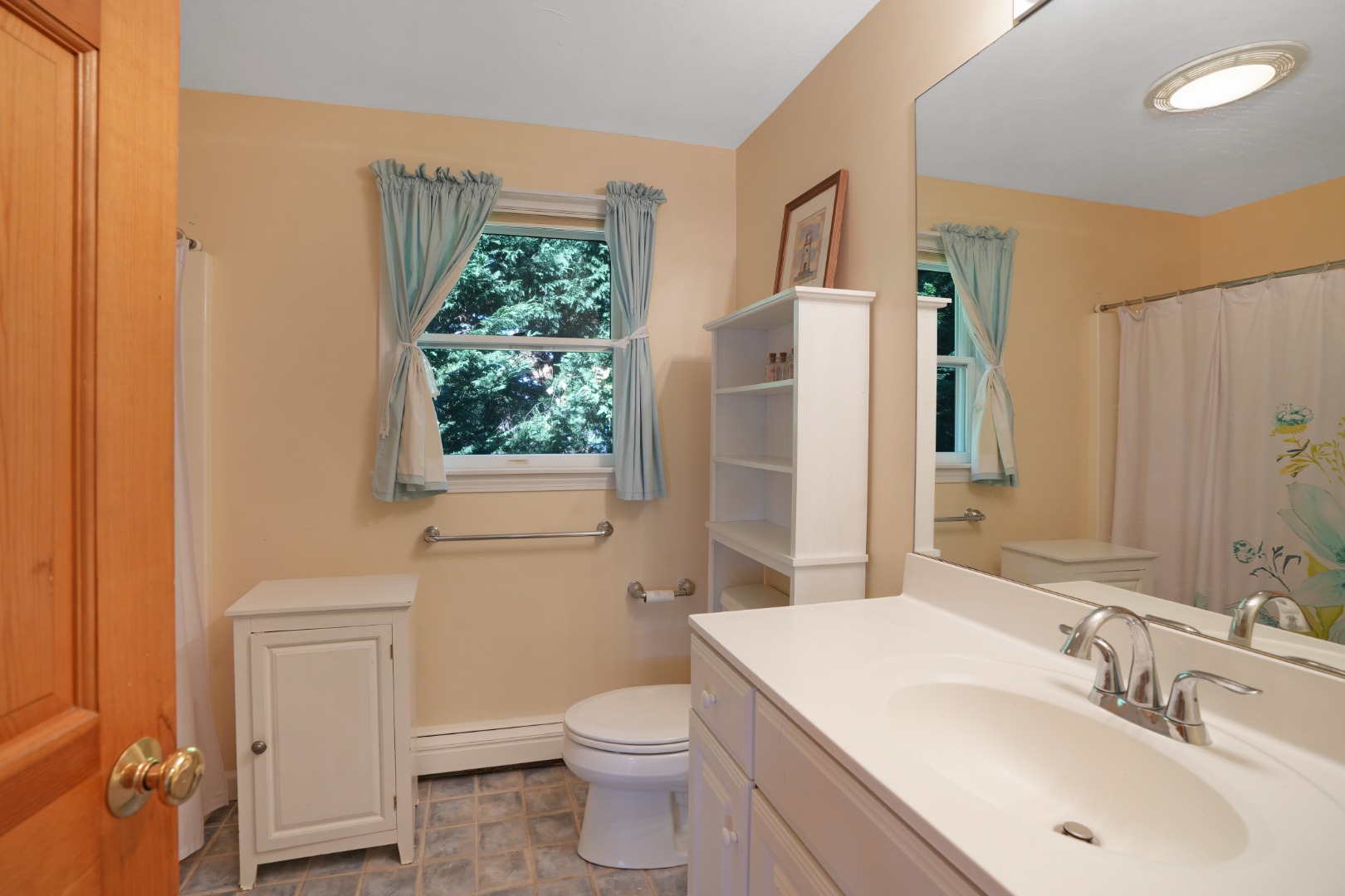 22 Old Lighthouse Road Vineyard Haven, MA 02568 - Photo 20 of 26 a bathroom with a sink toilet and shower
