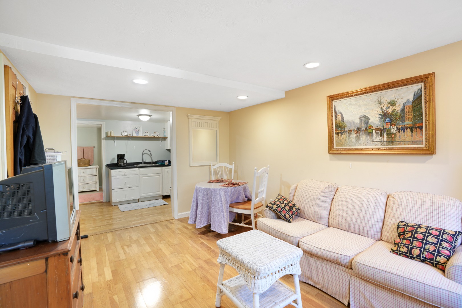 22 Old Lighthouse Road Vineyard Haven, MA 02568 - Photo 23 of 26 a living room with furniture and a flat screen tv