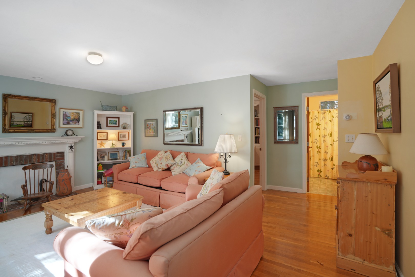 22 Old Lighthouse Road Vineyard Haven, MA 02568 - Photo 9 of 26 a living room with fireplace furniture and a flat screen tv