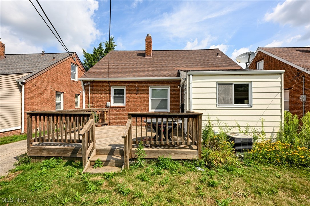 4166 Verona Road Cleveland, OH 44121 - Photo 40 of 43 Rear view of property featuring a wooden deck and cooling unit