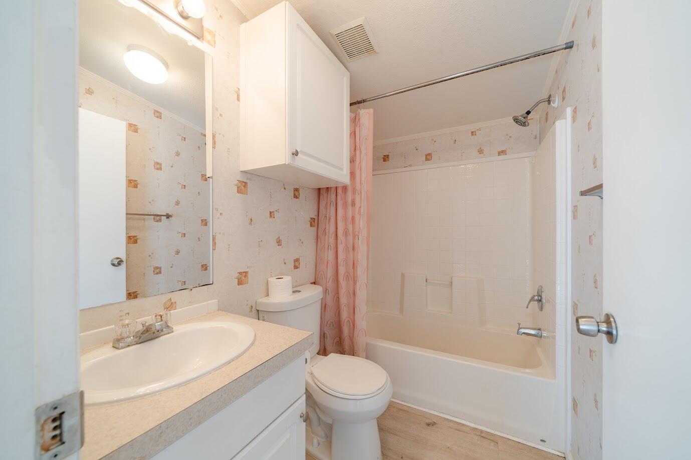 2016 Westerly Drive Rosamond, CA 93560 - Photo 11 of 20 a bathroom with a sink toilet and shower