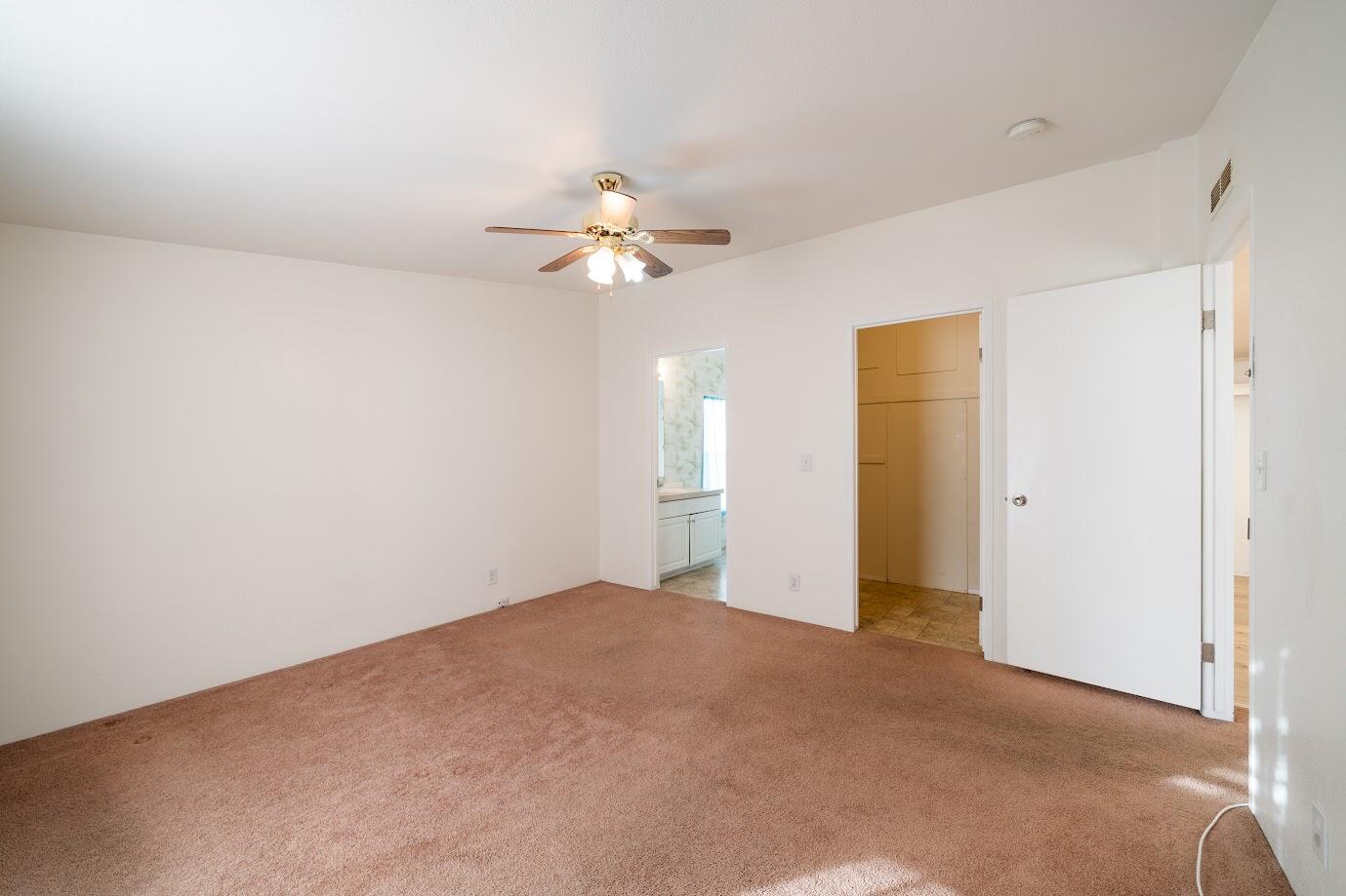 2016 Westerly Drive Rosamond, CA 93560 - Photo 14 of 20 a view of an empty room with a fan