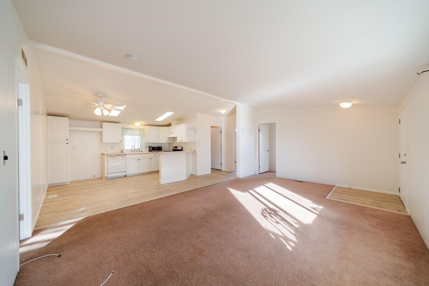 2016 Westerly Drive Rosamond, CA 93560 - Photo 4 of 20 a view of an empty room with a kitchen