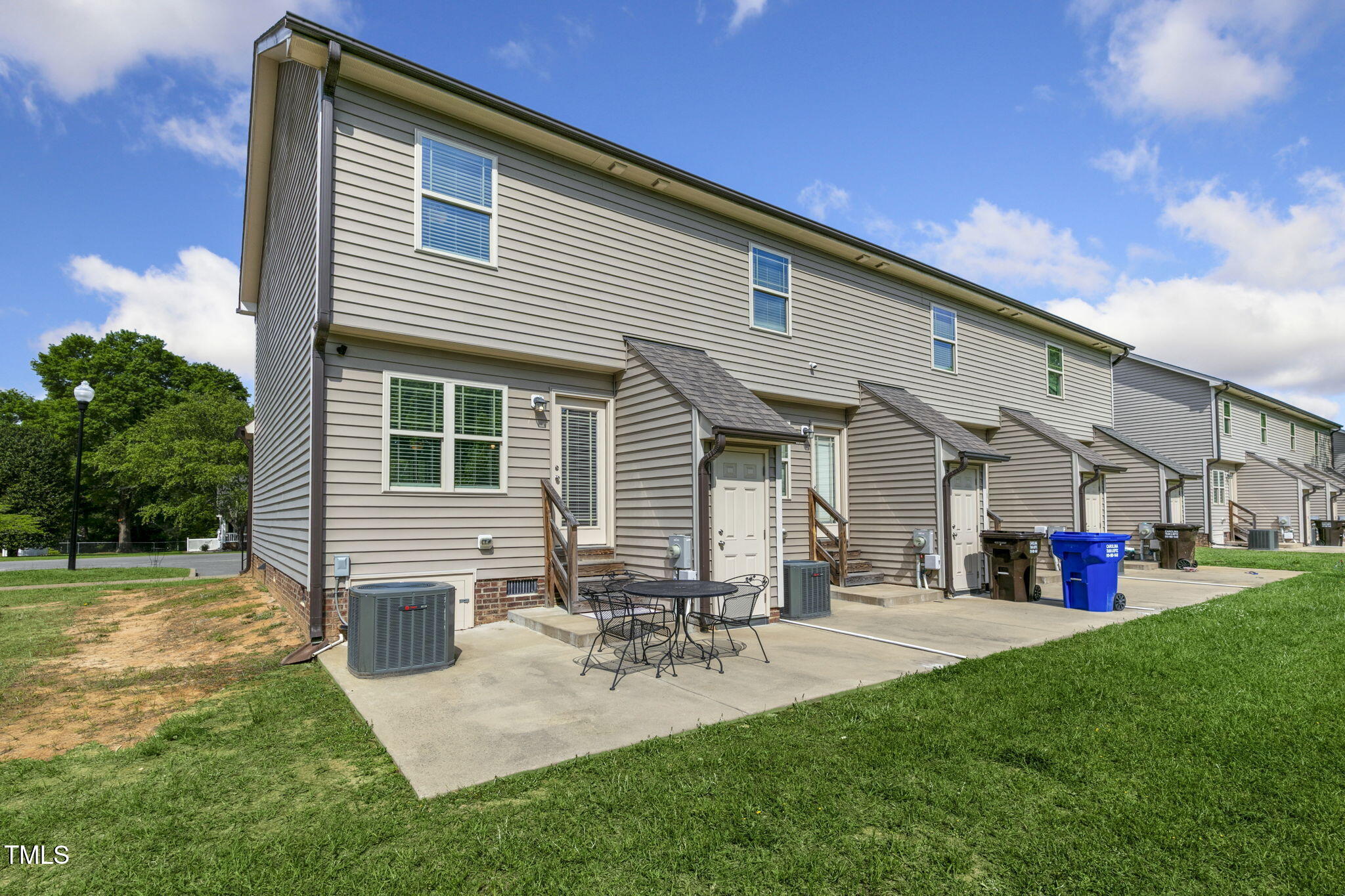 355 South Church Street Coats, NC 27521 - Photo 26 of 29 a view of a backyard with sitting area