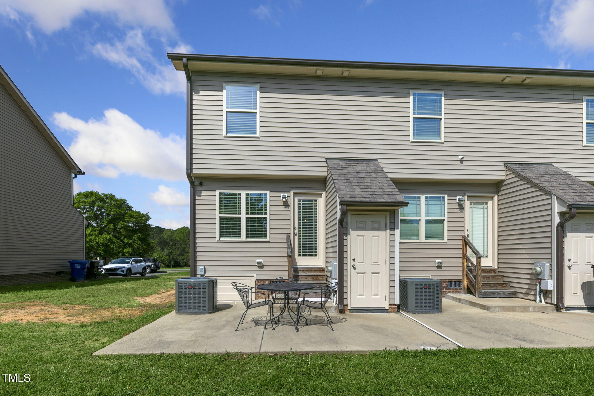 355 South Church Street Coats, NC 27521 - Photo 27 of 29 a view of a house with a backyard