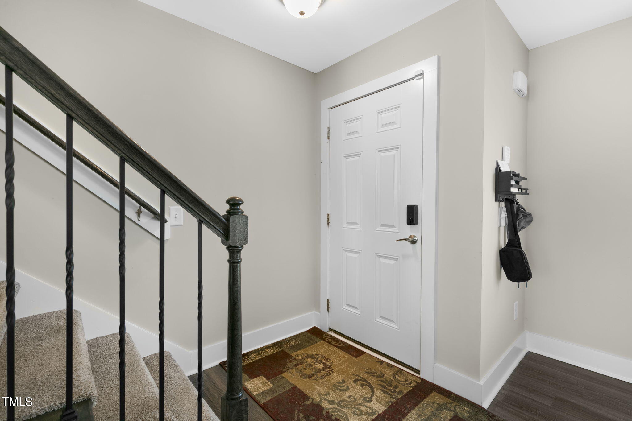 355 South Church Street Coats, NC 27521 - Photo 4 of 29 a view of a hallway with wooden floor and entryway