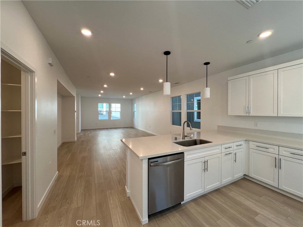 2544 Dorris Street El Monte, CA 91733 - Photo 4 of 13 a kitchen with a sink and cabinets