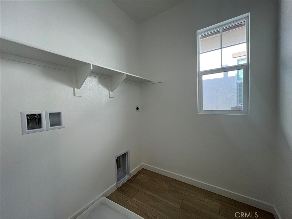 2544 Dorris Street El Monte, CA 91733 - Photo 8 of 13 a view of a room with rack on the wall and a window