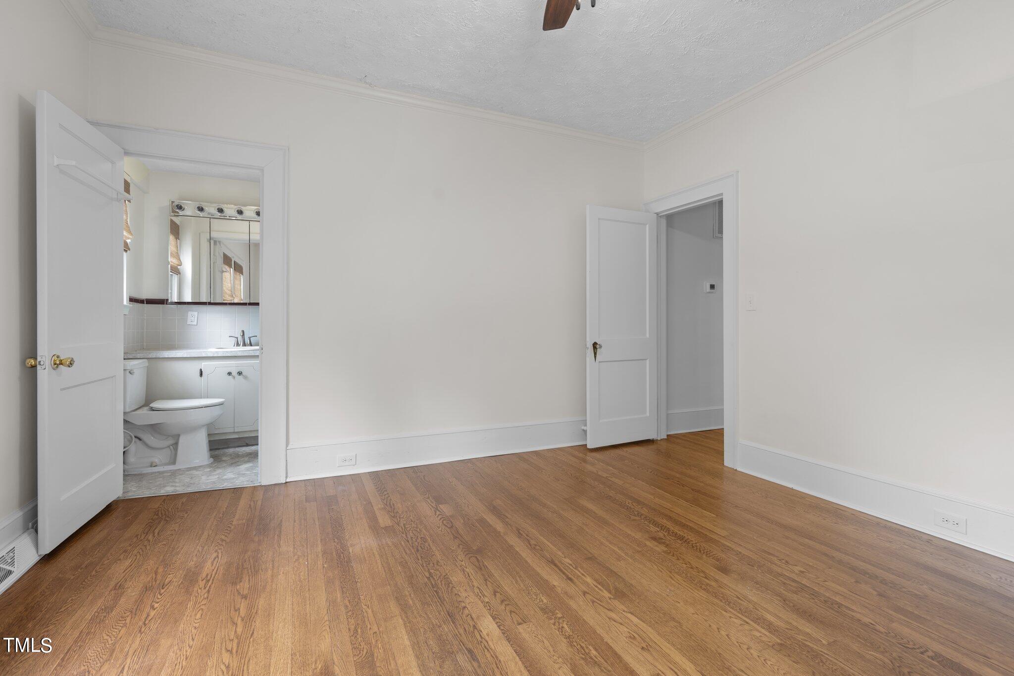 501 South Main Street Roxboro, NC 27573 - Photo 23 of 30 a view of empty room with wooden floor