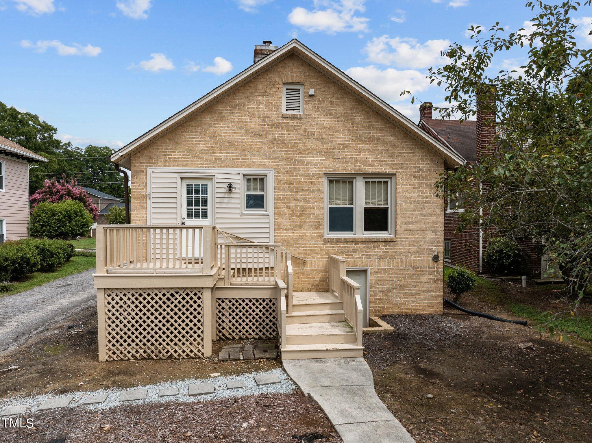 501 South Main Street Roxboro, NC 27573 - Photo 28 of 30 a front view of a house with a yard