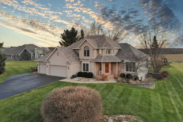 front view of a house with a yard