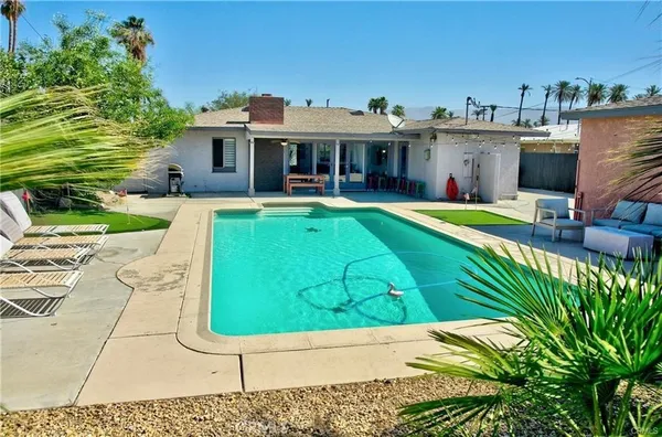 a house view with a garden space