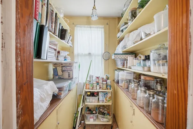 a room with lots of bottles of alcohol