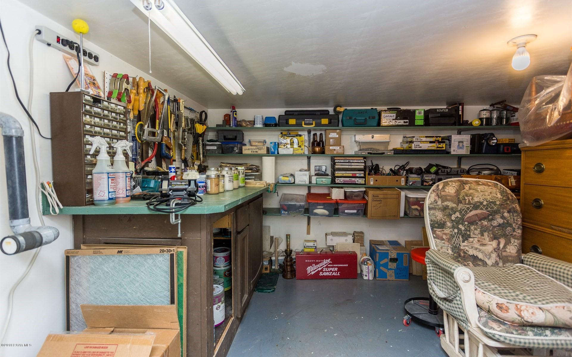 1631 Kaibab Loop Prescott, AZ 86303 - Photo 22 of 45 a storage room with washer and dryer