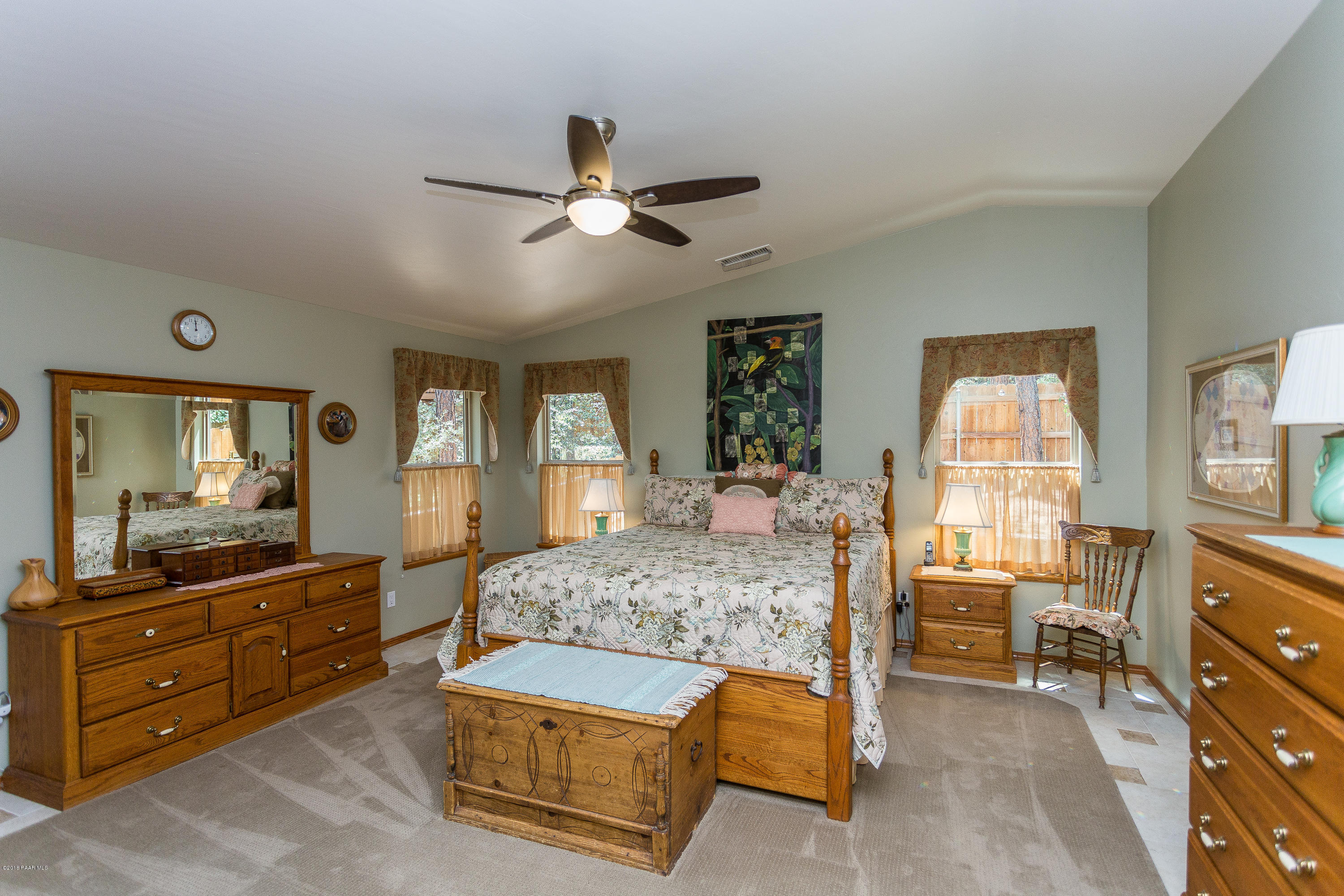1631 Kaibab Loop Prescott, AZ 86303 - Photo 26 of 45 a bedroom with a bed and a dresser in it