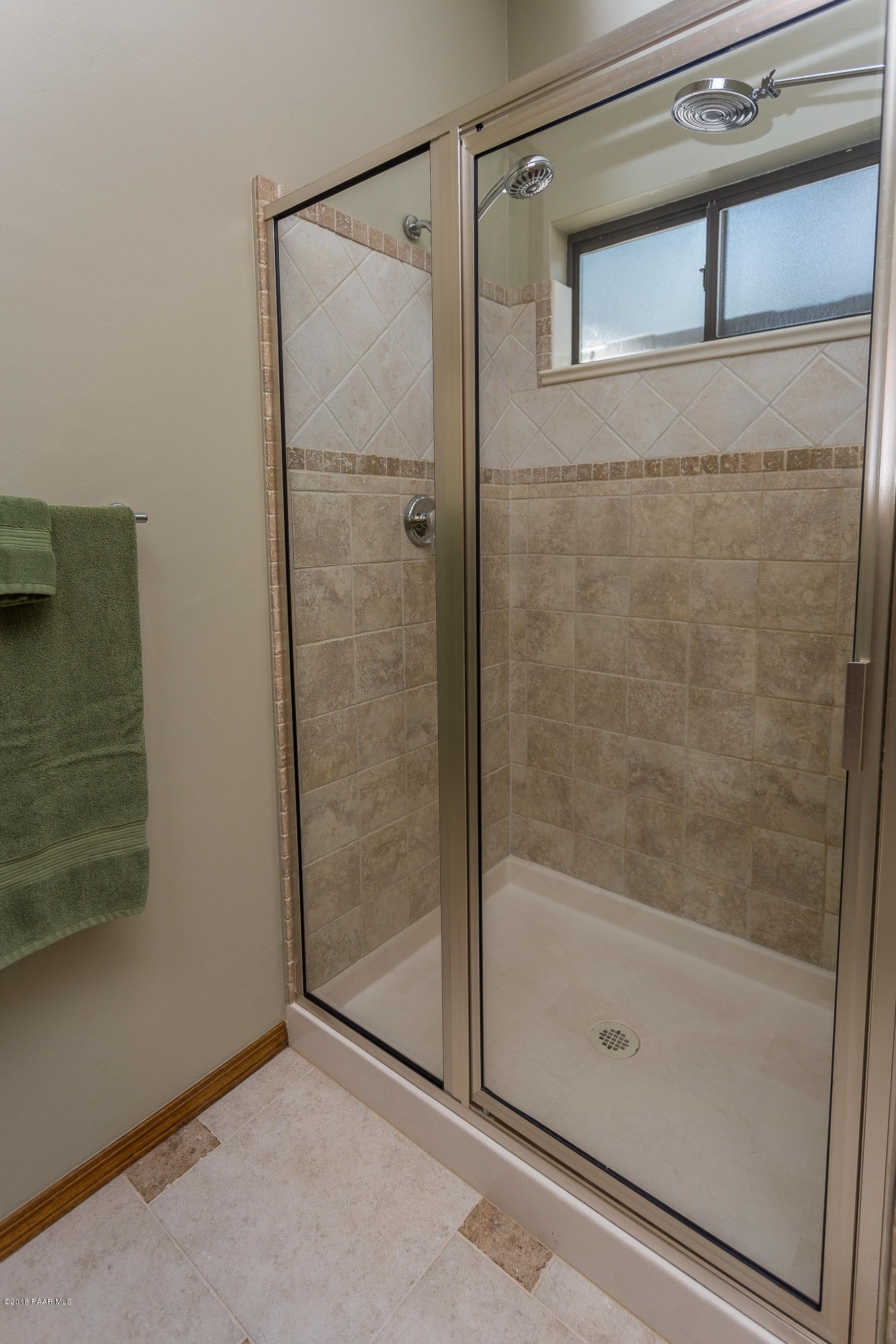 1631 Kaibab Loop Prescott, AZ 86303 - Photo 30 of 45 a bathroom with a glass shower door