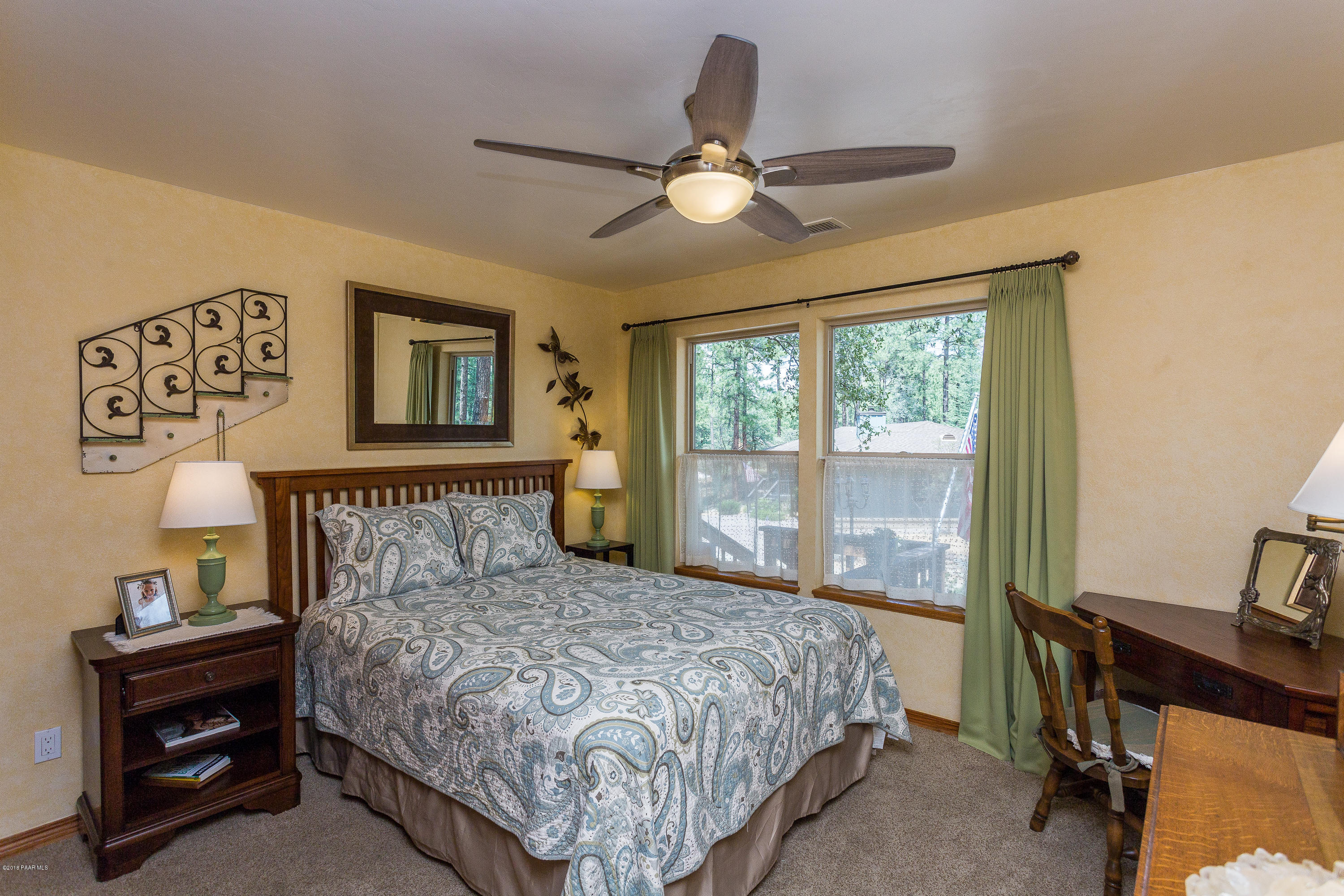 1631 Kaibab Loop Prescott, AZ 86303 - Photo 31 of 45 a bedroom with a bed and a window