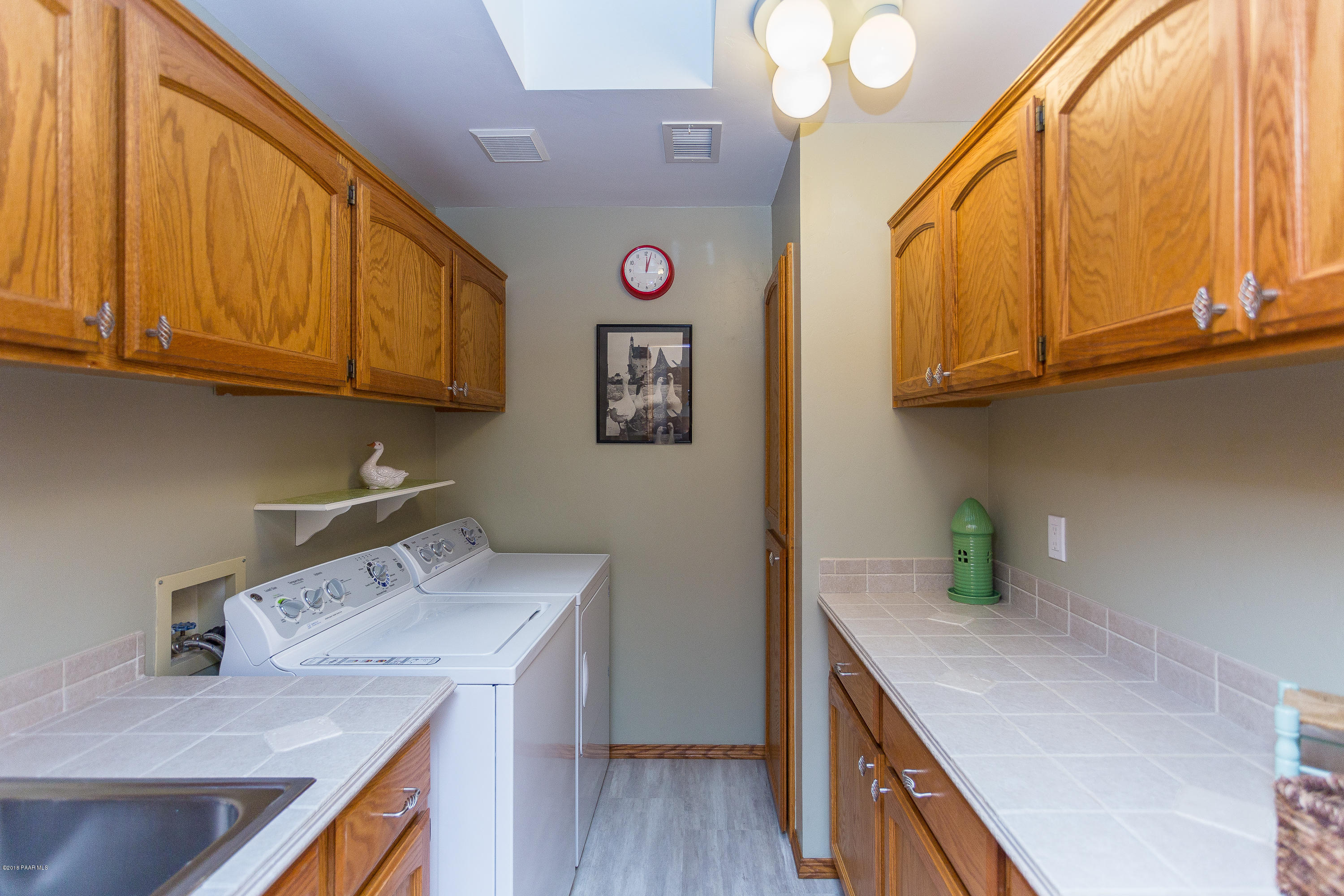 1631 Kaibab Loop Prescott, AZ 86303 - Photo 37 of 45 a kitchen with a sink and cabinets