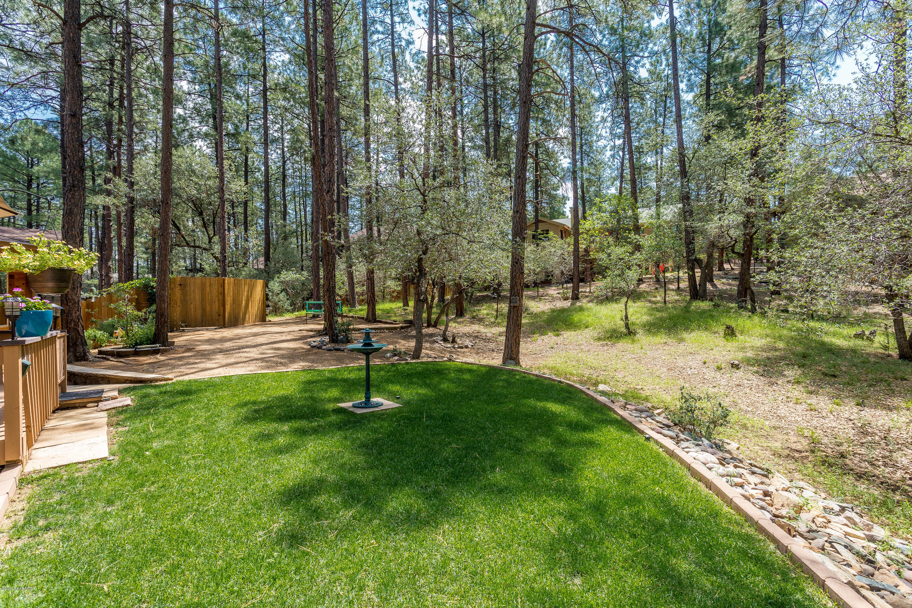 1631 Kaibab Loop Prescott, AZ 86303 - Photo 42 of 45 a swimming pool with outdoor seating and yard