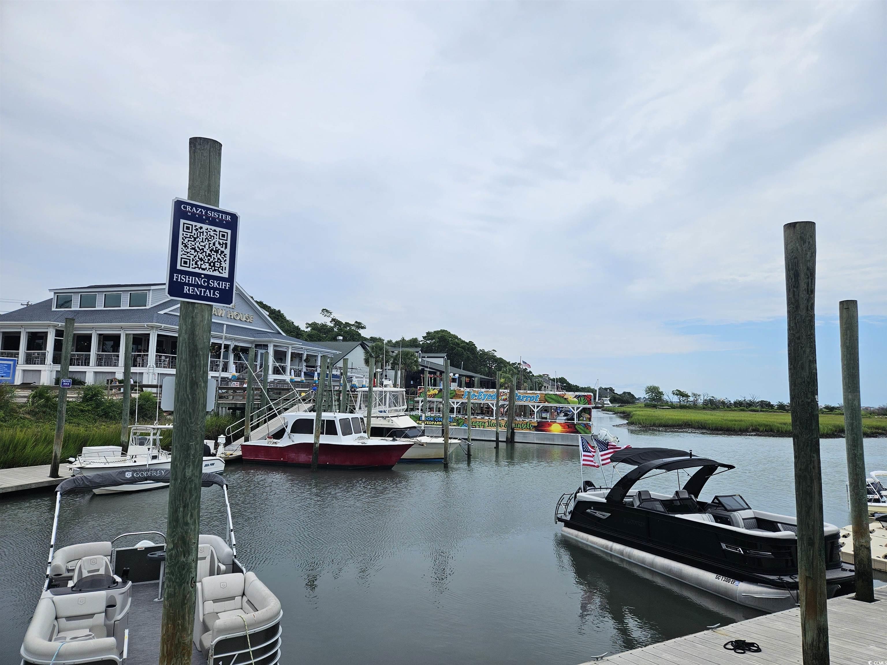 62 Sea Shell Drive, Unit 62 Murrells Inlet, SC 29576 - Photo 15 of 34 Dock with a water view