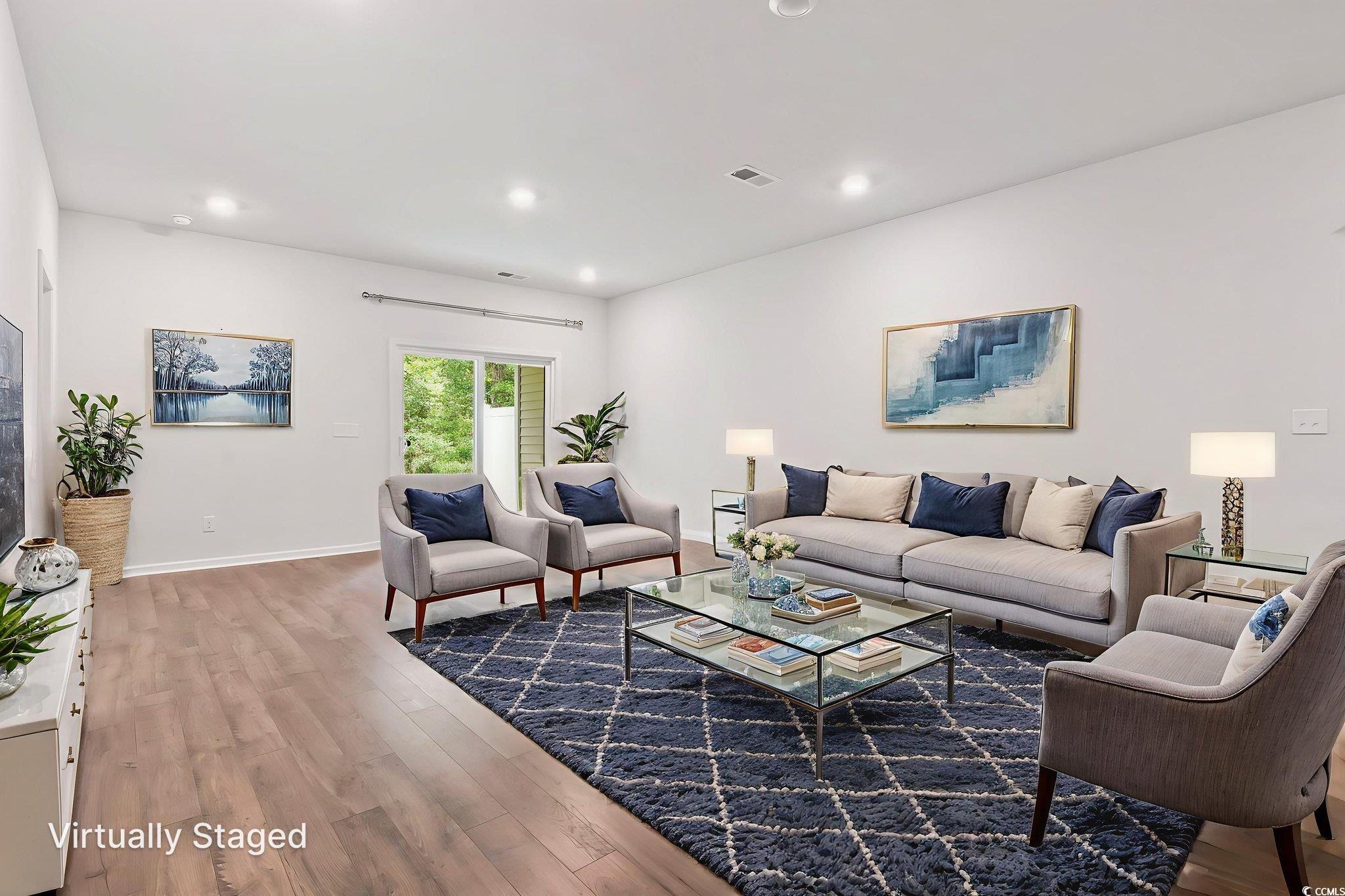 62 Sea Shell Drive, Unit 62 Murrells Inlet, SC 29576 - Photo 2 of 34 Living room featuring wood finished floors and recessed lighting