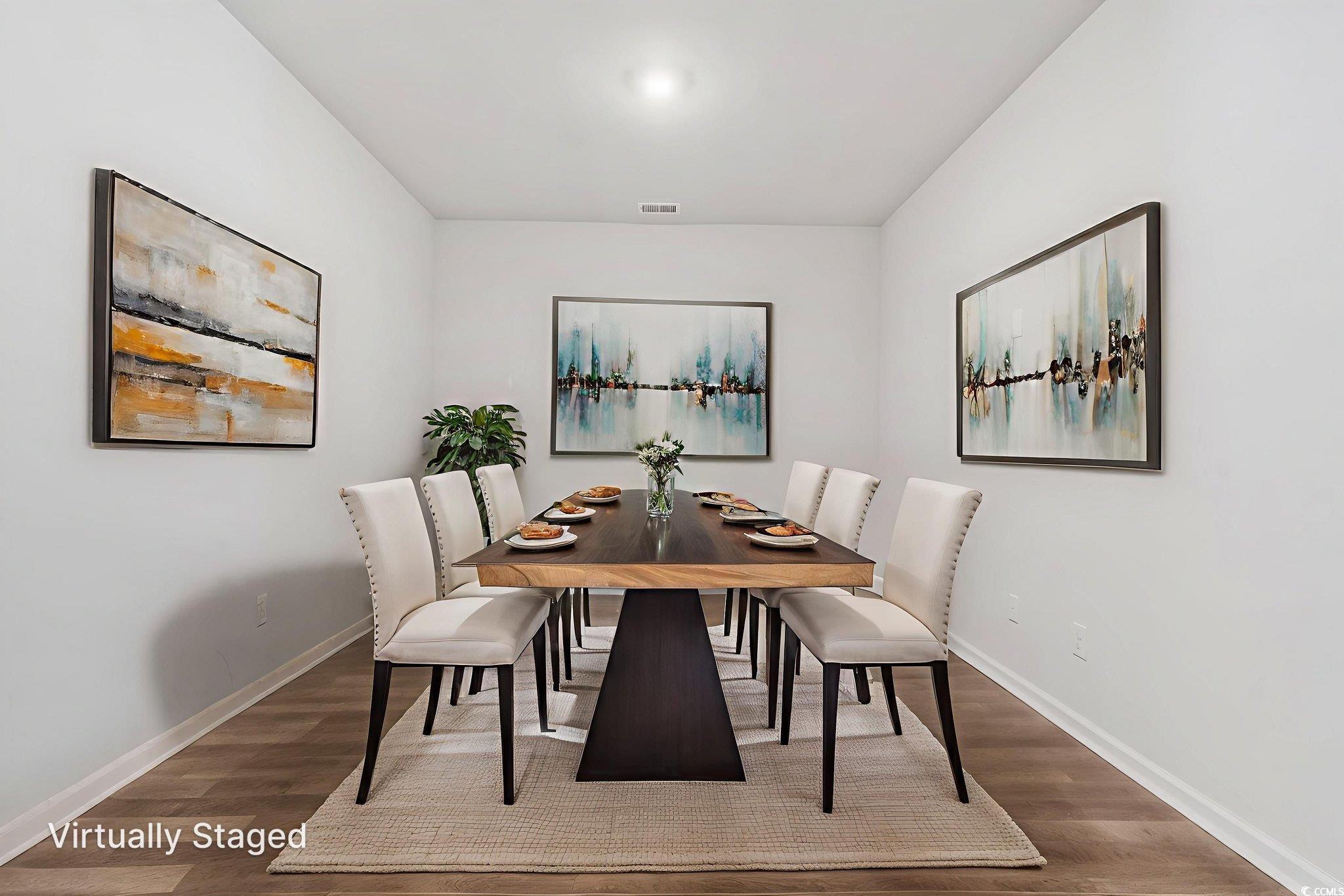 62 Sea Shell Drive, Unit 62 Murrells Inlet, SC 29576 - Photo 3 of 34 Dining space featuring wood finished floors