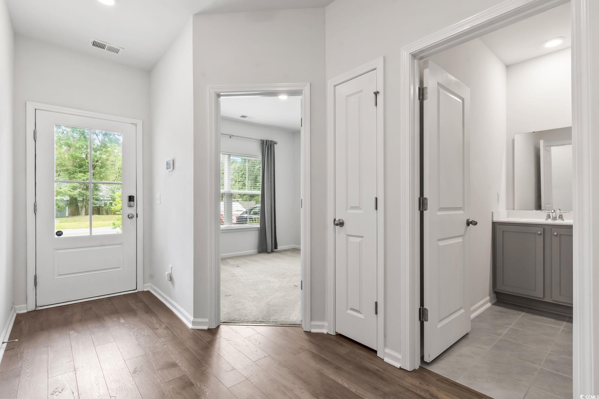 62 Sea Shell Drive, Unit 62 Murrells Inlet, SC 29576 - Photo 9 of 34 Foyer featuring wood finished floors and recessed lighting
