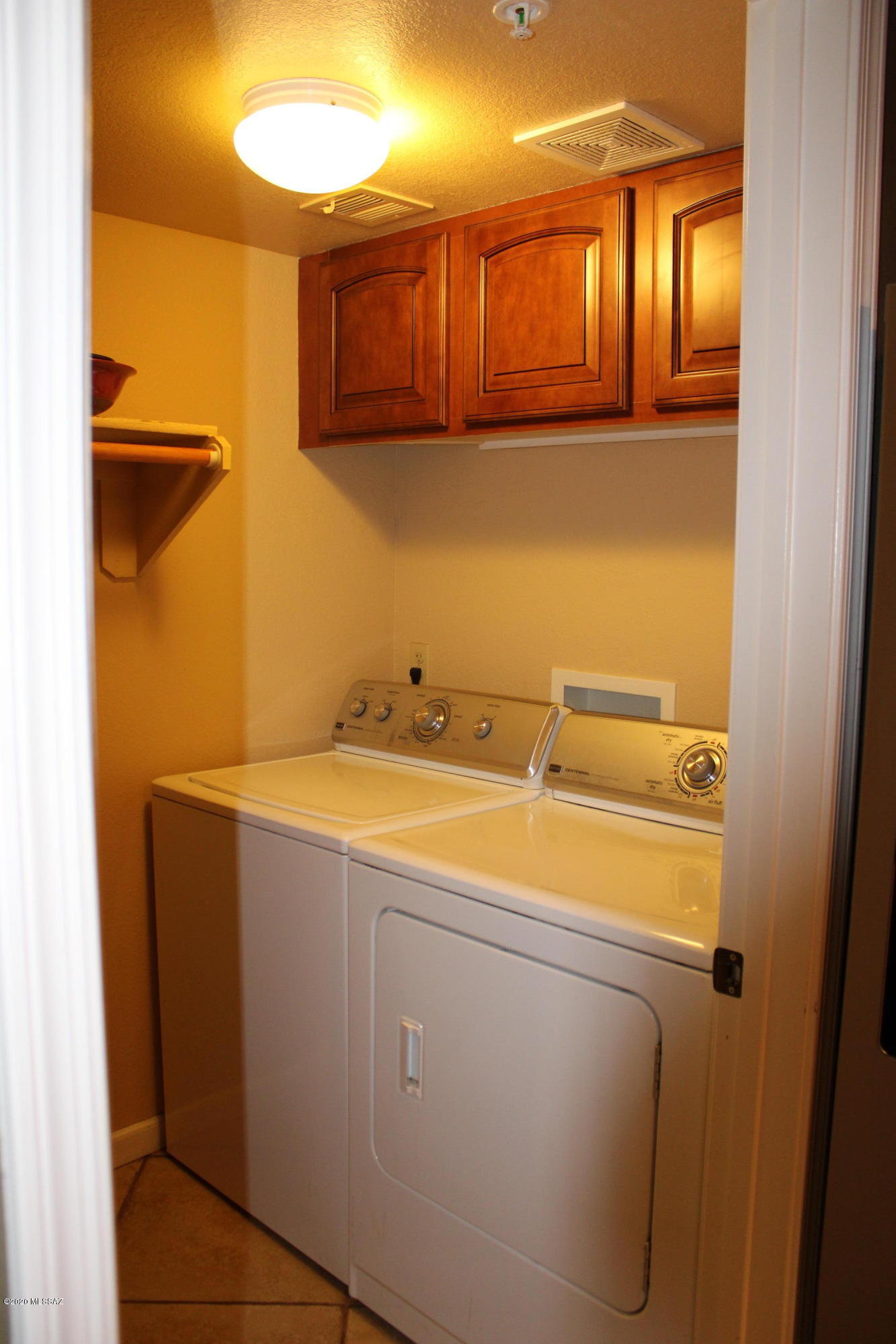 5751 North Kolb Road, Unit 36203 Tucson, AZ 85750 - Photo 16 of 25 a utility room with dryer and washer