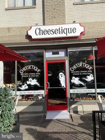 a view of a chairs and table in a backyard