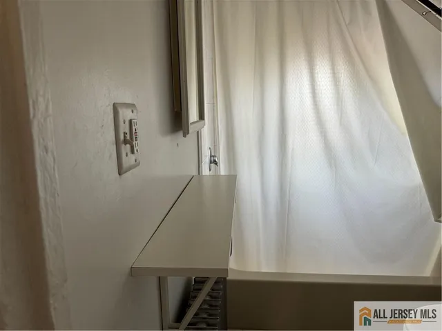 a view of balcony with furniture