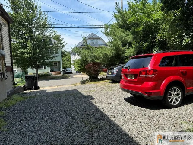 a view of a car in front of a house