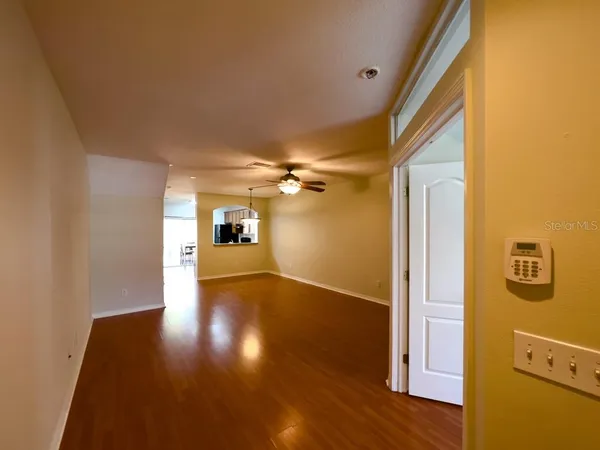 a view of a livingroom with wooden floor