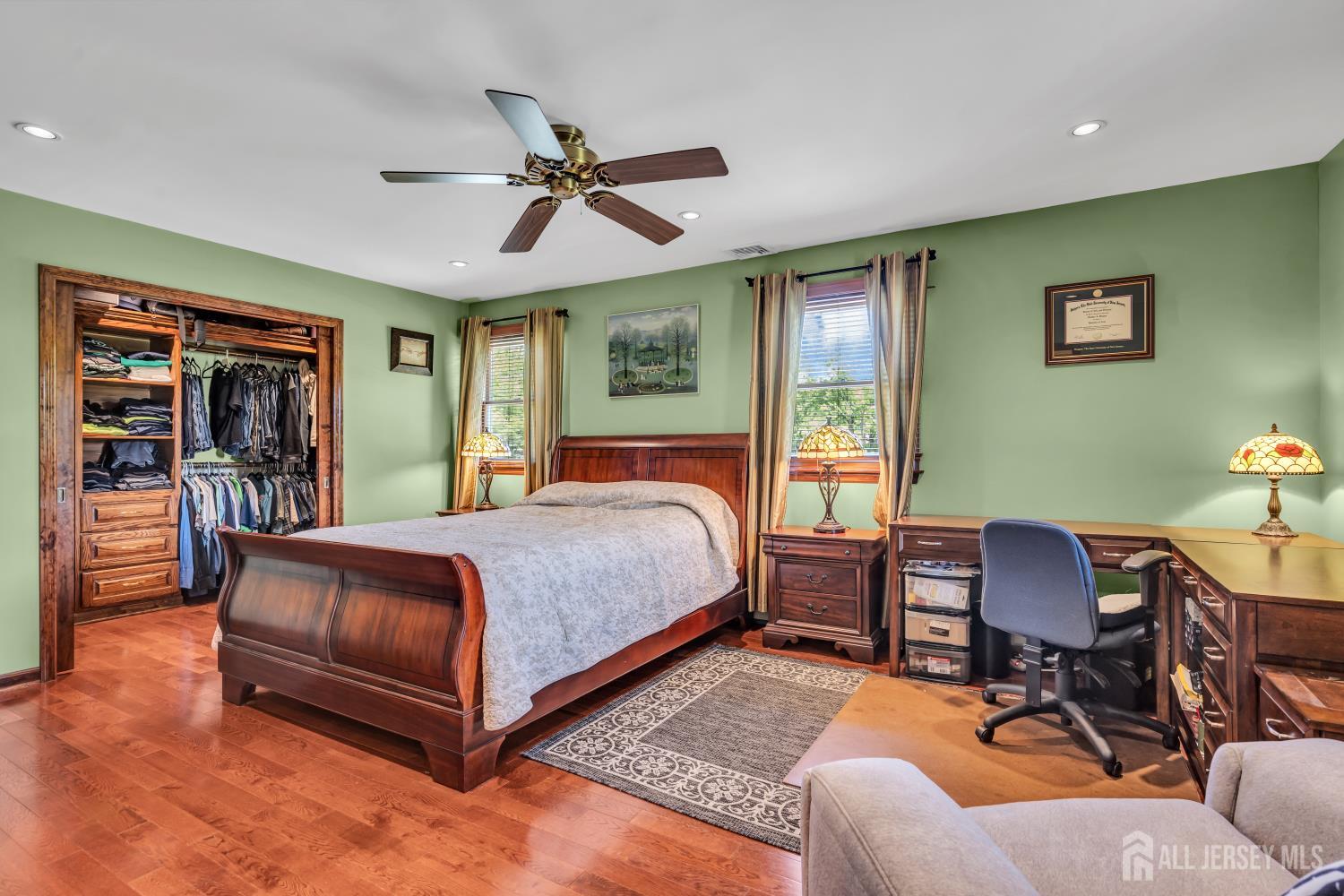99 Schulmeister Road Old Bridge, NJ 08857 - Photo 21 of 49 a bedroom with a bed and wooden floor