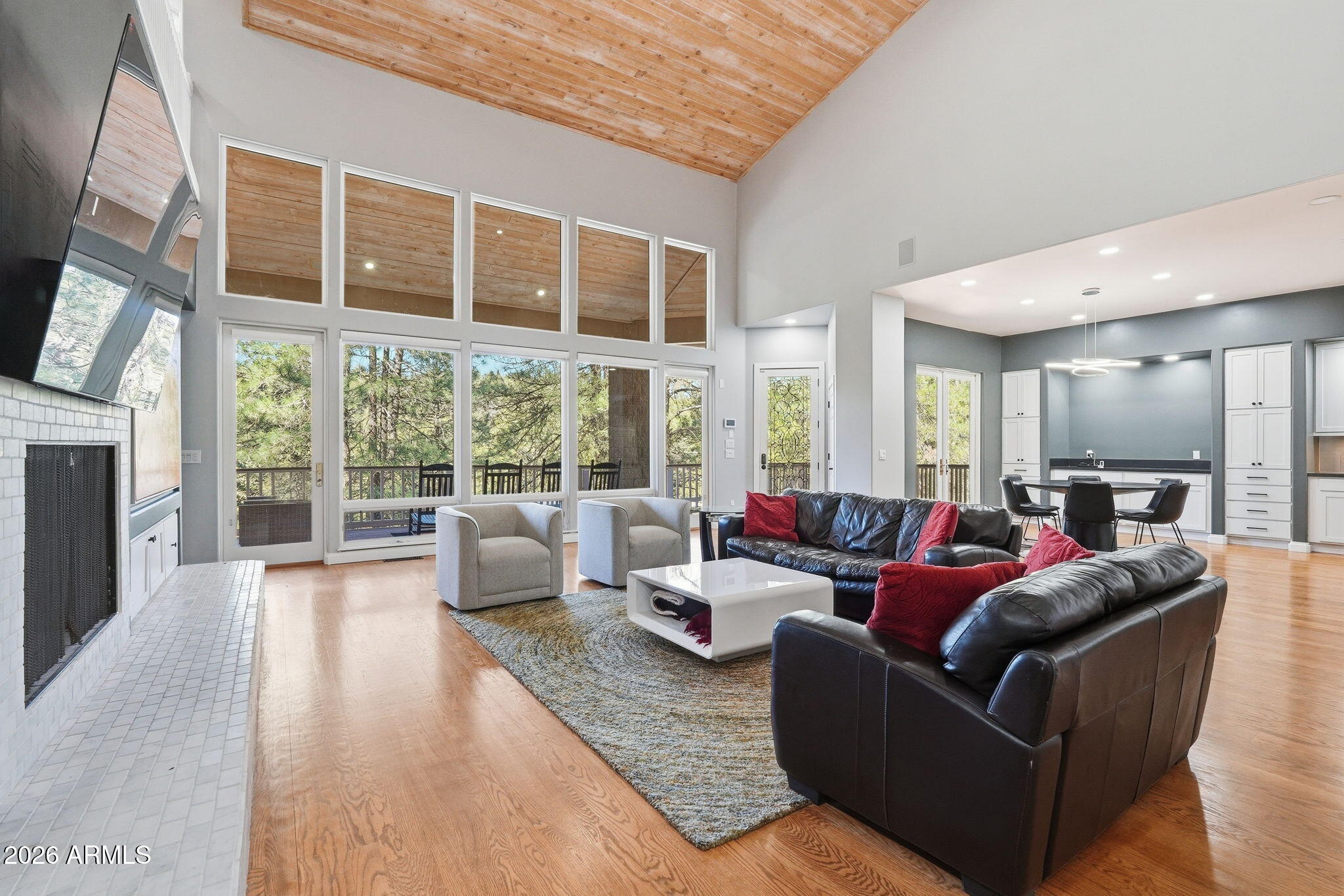 3441 Griffiths Spring Flagstaff, AZ 86005 - Photo 14 of 71 a living room with fireplace furniture and a large window