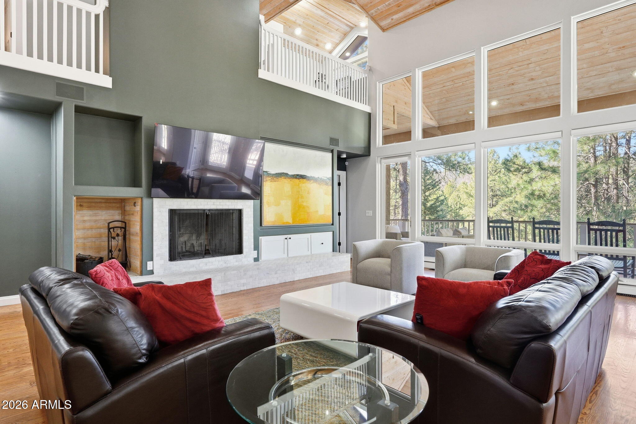 3441 Griffiths Spring Flagstaff, AZ 86005 - Photo 16 of 71 a living room with furniture fireplace and a large window