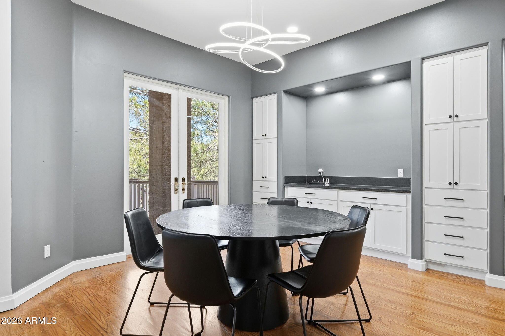 3441 Griffiths Spring Flagstaff, AZ 86005 - Photo 17 of 71 a view of a dining room with furniture window and wooden floor