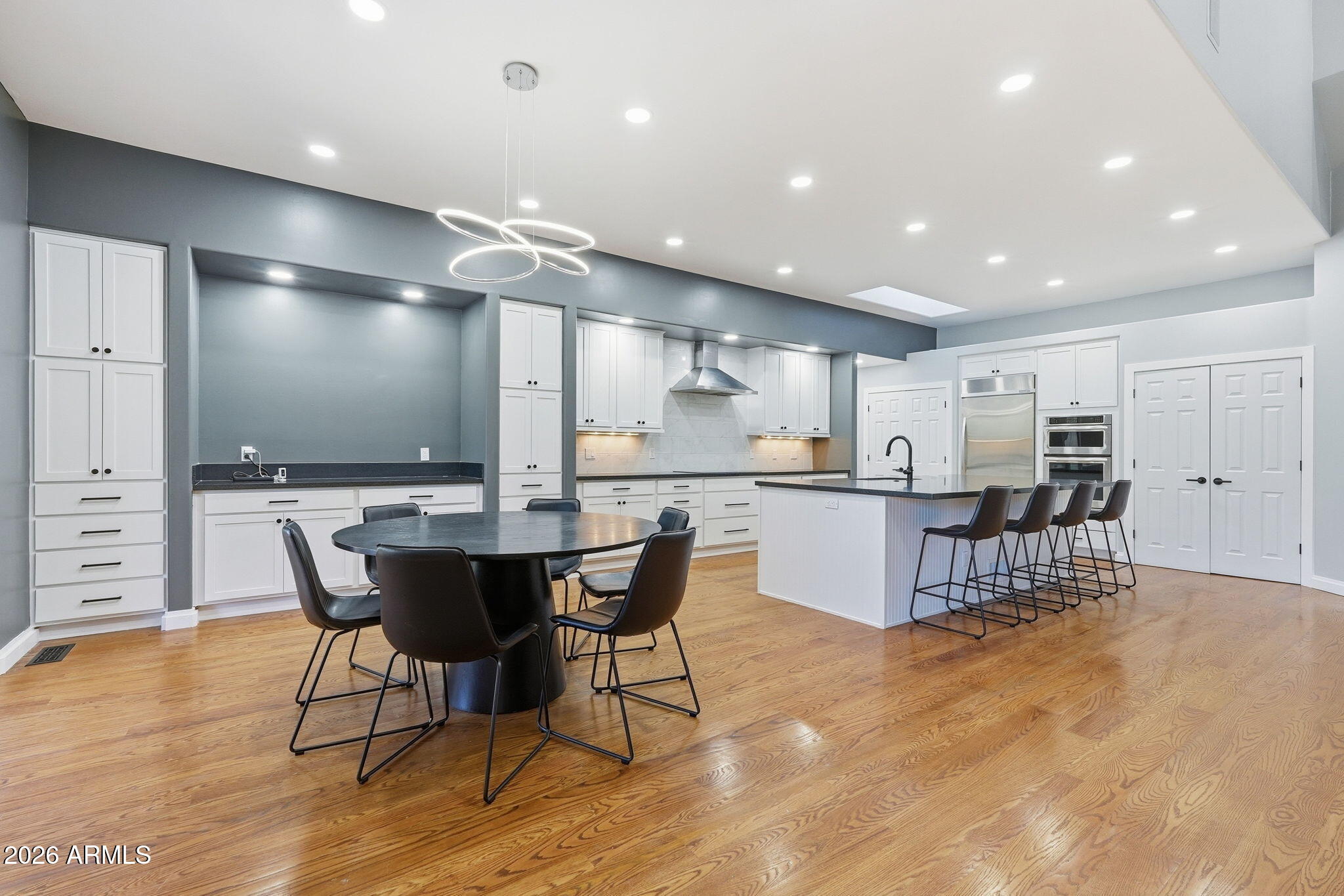 3441 Griffiths Spring Flagstaff, AZ 86005 - Photo 19 of 71 a kitchen with a table and chairs in it