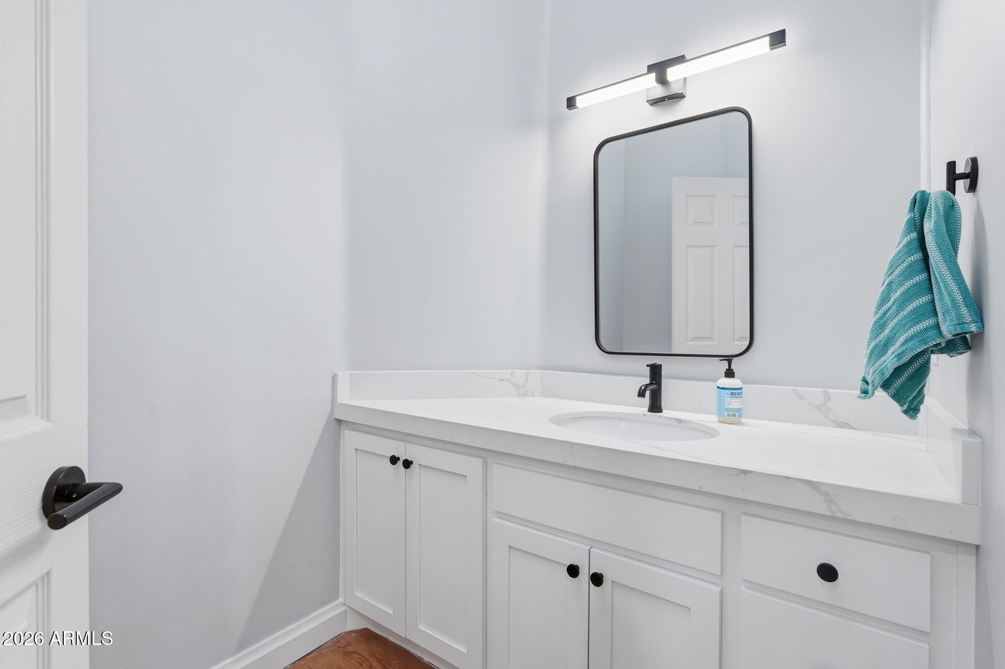 3441 Griffiths Spring Flagstaff, AZ 86005 - Photo 29 of 71 a bathroom with a sink and a mirror