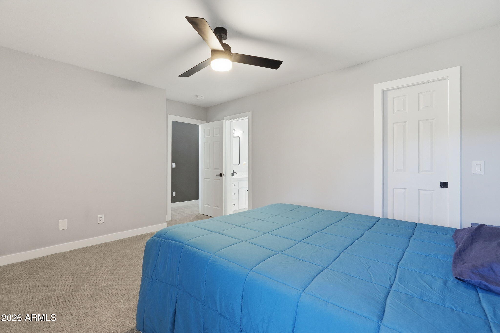 3441 Griffiths Spring Flagstaff, AZ 86005 - Photo 38 of 71 a bedroom with a bed and a ceiling fan