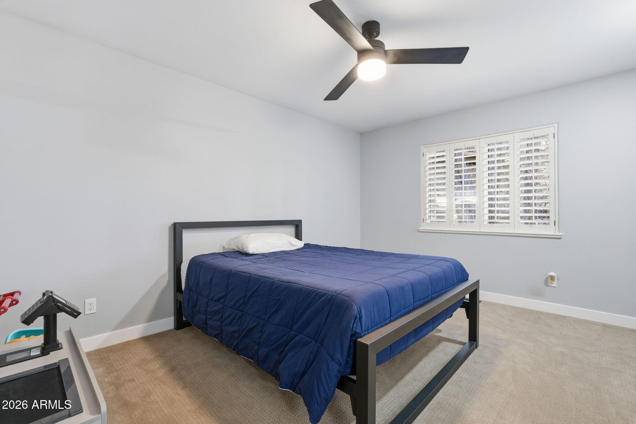 3441 Griffiths Spring Flagstaff, AZ 86005 - Photo 40 of 71 a bedroom with a bed and a window