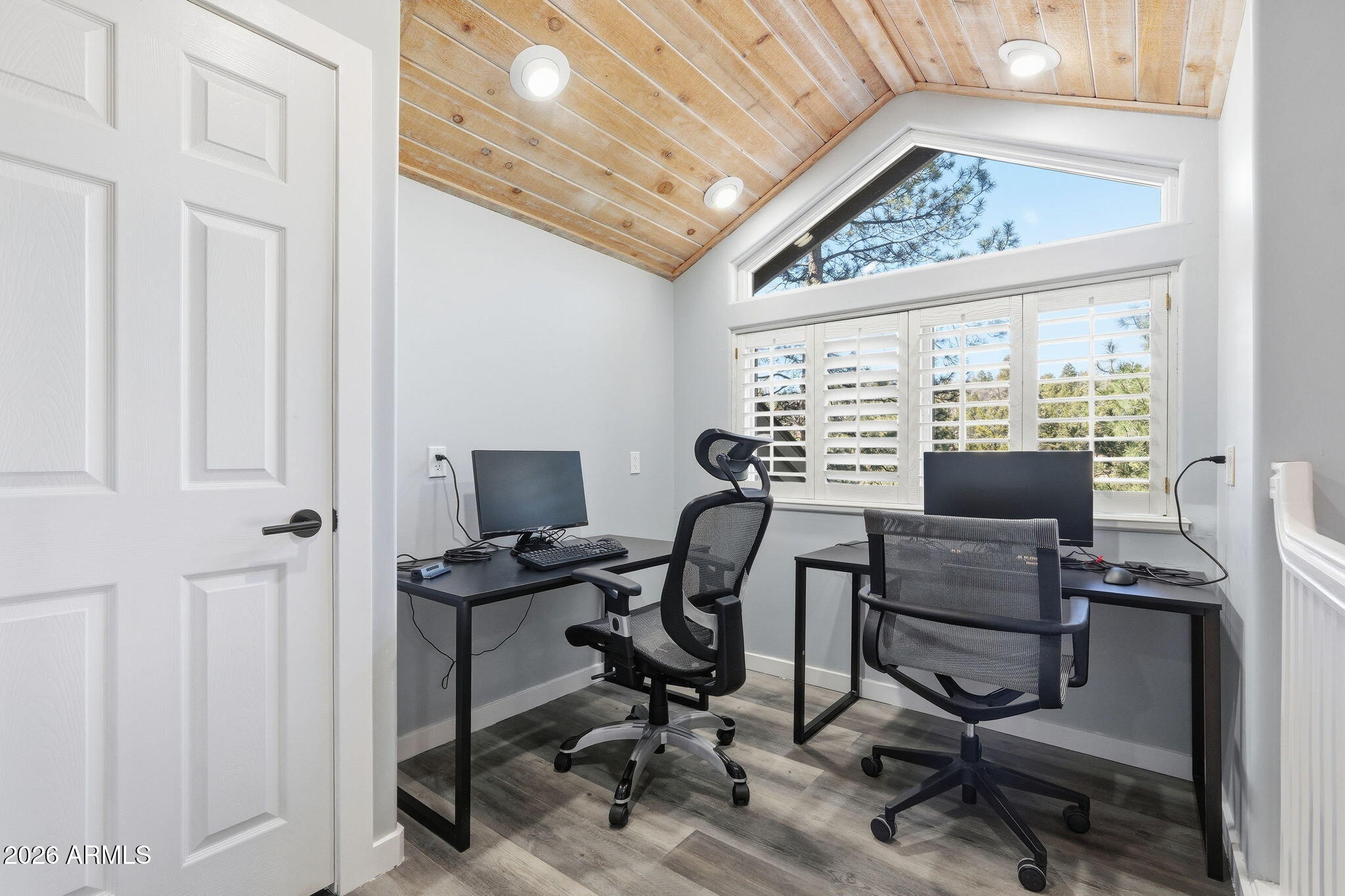 3441 Griffiths Spring Flagstaff, AZ 86005 - Photo 42 of 71 a view of a workspace with furniture and a window