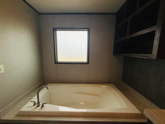 a bathroom with a window