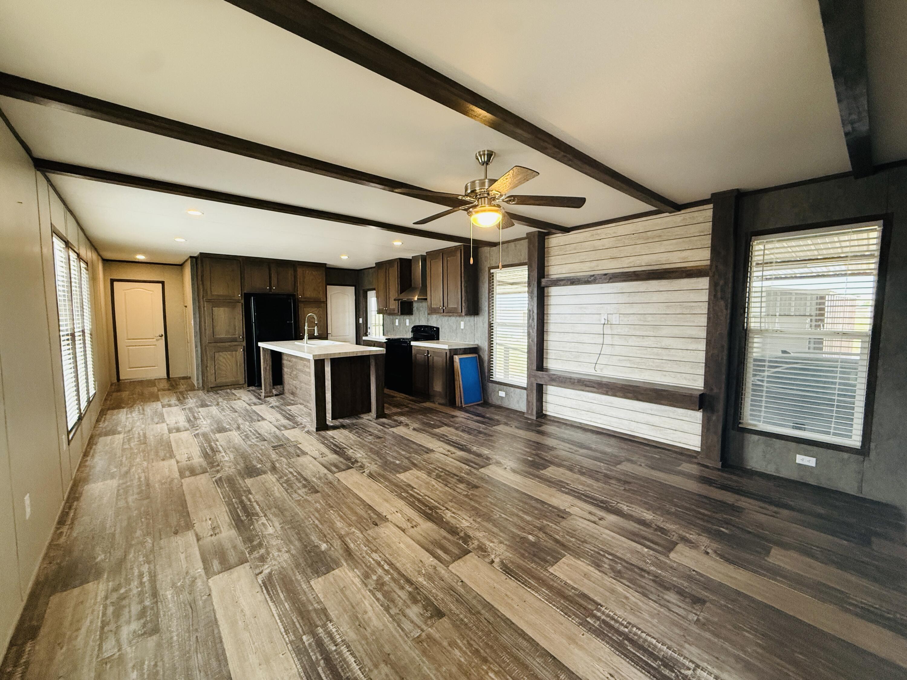 365 Private Road 211 Road North Seminole, TX 79360 - Photo 5 of 22 a view of a livingroom with a furniture