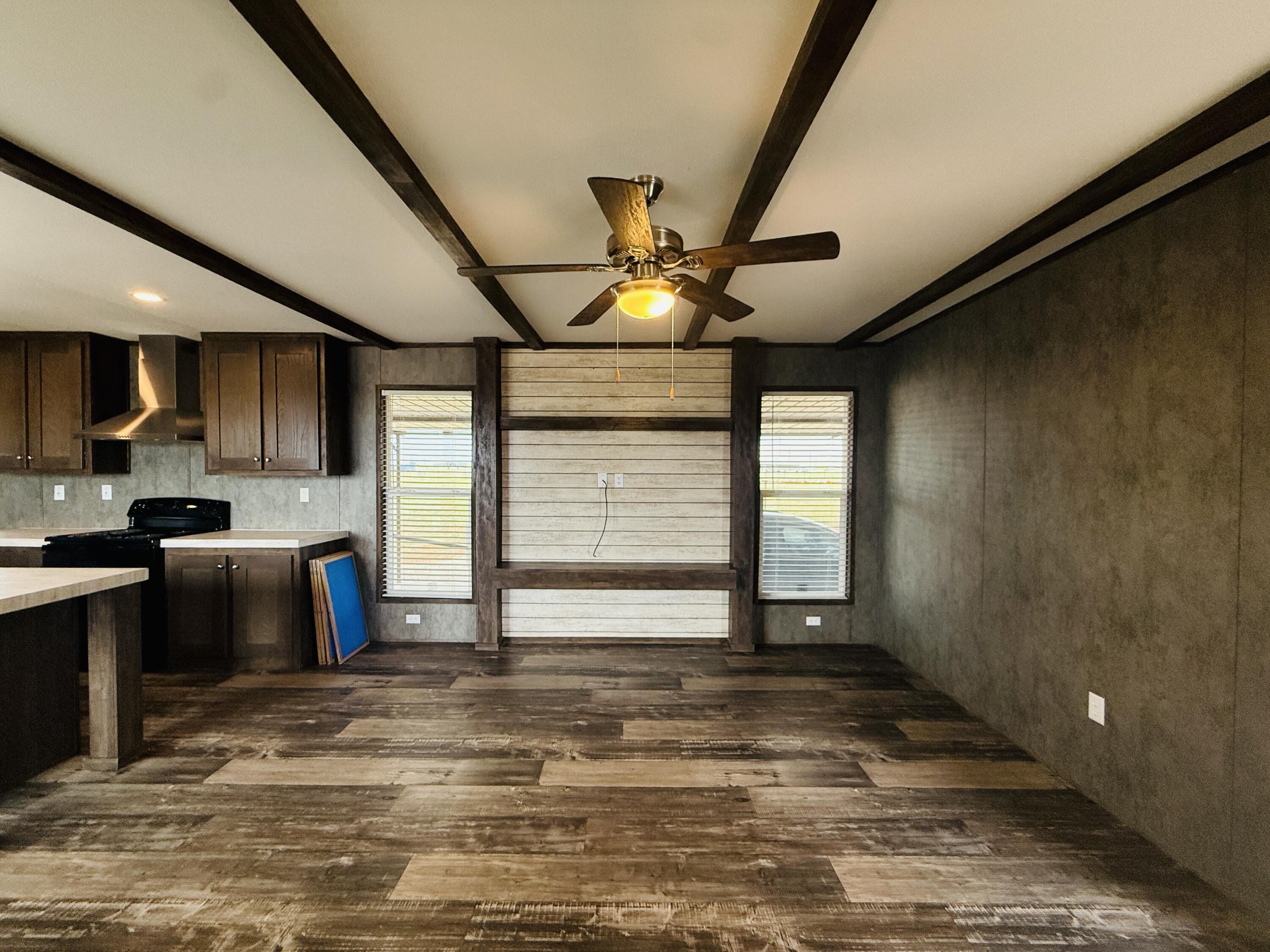 365 Private Road 211 Road North Seminole, TX 79360 - Photo 6 of 22 a view of a livingroom with a fireplace