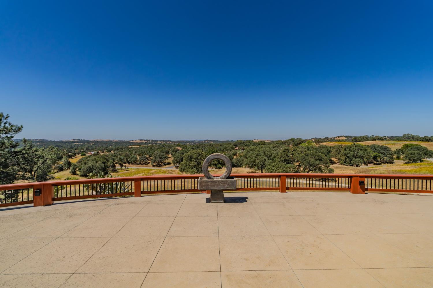 15070 Willow Creek Road Ione, CA 95640 - Photo 45 of 66 a view of a terrace with a bench
