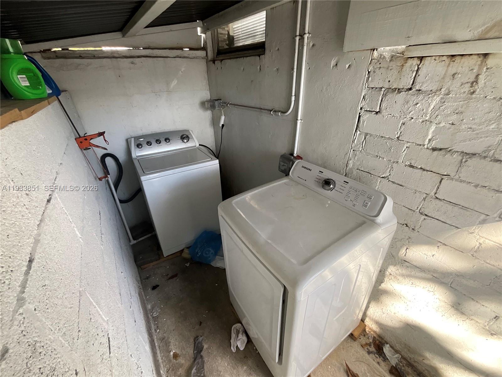 1868 Northwest 64th Street Miami, FL 33147 - Photo 18 of 21 a utility room with dryer and washer