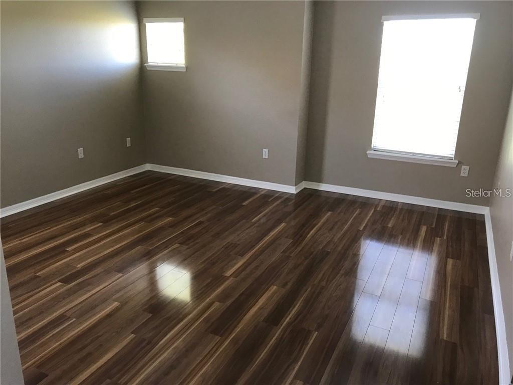 7542 Red Mill Circle New Port Richey, FL 34653 - Photo 16 of 27 a view of room with window